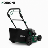 KOIBONI TurfMaster 20-inch 185cc power lawn mower with 3-in-1 functionality, shown in a garden setting.