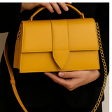 Yellow shoulder bags