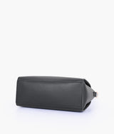 Black handbag with flower charm for women