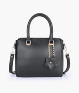 Black handbag with flower charm for women