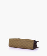 Brown color checkered on-the-go mini bag