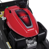 Honda HRX217K5VKA 21-inch gas lawn mower with 187cc engine and Versamow 4-in-1 system, shown with engine close-up.
