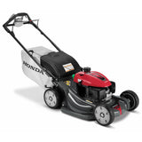 Honda HRX217K5VKA 21-inch gas lawn mower with 187cc engine and 4-in-1 Versamow system, shown in a green yard setting.