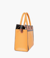 Sac à main vintage couleur moutarde