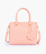 Peach handbag with flower charm for women