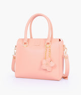 Peach handbag with flower charm for women